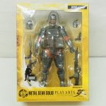 フィギュアの箱の表面のクローズアップ。本体の全身と武器パーツが見える。