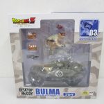 DESKTOP REAL McCOY ブルマの外箱表面。窓越しに本体とバイクが見える。