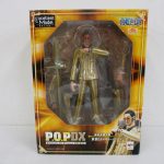P.O.P DX 海軍本部大将 黄猿 ボルサリーノの外箱表面。金色の背景にキャラクター写真が並ぶ。