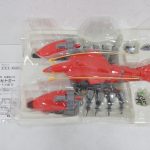 ブリスター全体。赤い本体、小型のゾイド、シール、葉書が収まっている。