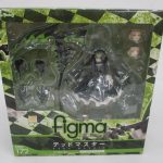 figma デッドマスターの外箱表面。窓越しに本体と付属品が見える。