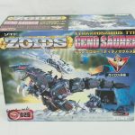 ゾイド EZ-026 ジェノザウラーの外箱表面。ティラノサウルス型の機体が描かれている。