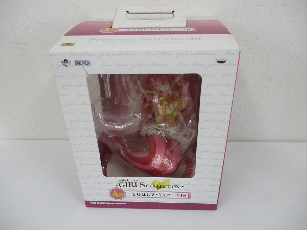 一番くじ ワンピース GIRLS COLLECTION A賞 しらほしフィギュアの外箱表面。窓の奥に本体が入っている。