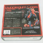 外箱の裏面。変形の解説と付属品の記載がある。