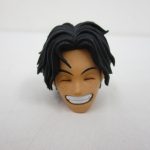交換用の頭部を単体で撮影。笑った表情。
