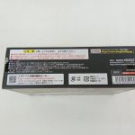 外箱の底面。注意書きと販売元の表示、バーコード