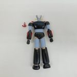 本体を背面から写した写真と小さなパーツ