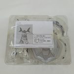ブリスターに収まった本体と注意書きの紙