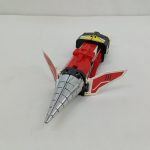 ドリルの付いた赤い車両