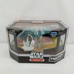 八角形の窓付きの箱の正面。STAR WARS Slave IとTRILOGY COLLECTIONのロゴ