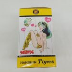 箱の側面。ラムとテンのイラストとHANSHIN Tigersの文字