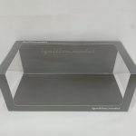 透明ケースだけを写した写真。ignition modelのロゴ