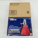 輸送箱と商品箱の正面。聖闘士聖衣神話 ポラリスヒルダの印字と赤いスカートの人物の絵