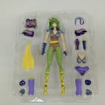 透明トレイに入った緑の髪の女性フィギュアと、交換用のパーツ一式。