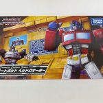 外箱の正面。「TRANSFORMERS Dramatic Capture Series オートボット ヘッドクオーター」の文字とキャラクターの絵があります。