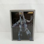 外箱の正面のアップ。メカゴジラの全身写真と「DX超合金魂」のマークが写っています。