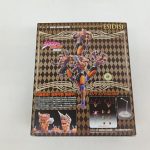 外箱の背面。本体の作例写真と付属パーツの写真、説明の文が並んでいます。