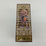 外箱の側面。菱形模様の中にキャラクターの全身写真と「ESIDISI」の印字。