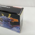外箱を斜め上から。上面の「GUNDAM CONVERGE SB」の印字と側面の写真。