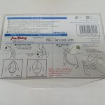 パッケージ背面の説明の紙。取り扱いの図解、注意書きとバーコードが印刷されています。