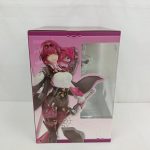 商品箱の別の側面。カフカのイラストと窓から見えるフィギュア