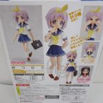 外箱の背面。柊つかさ の写真と付属パーツの説明があります。