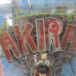AKIRAのネオン看板を模した台座のアップ。