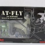 外箱正面。窓越しに本体が見え、AG-EX02 と AT-FLY and SCOPEDOG、1/48 SCALE の印字があります。値札シールが貼られています。