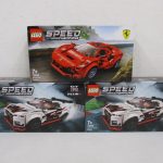 3つの箱を積んだ写真。上の赤い車の箱が本商品の 76895 Ferrari F8 Tributo です。