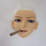 付属の差し替え用の顔。葉巻をくわえています。