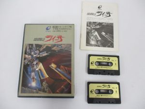 箱と説明書、カセットテープ2本を並べて撮影。箱に 地球戦士ライーザ と ENIX の印字があります。