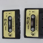 カセットテープ2本のラベル。No.1 と No.2 に MSX（要RAM32K以上）と E-M007 の表示があります。