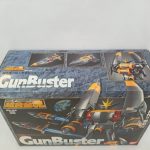外箱を斜めから写した面。GunBusterのロゴとバスターマシンの絵