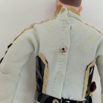 隊員服の背面の拡大。スナップボタン