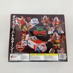 外箱の裏面。ダイモス！バトルターン！の文字と変形の写真、バーコード