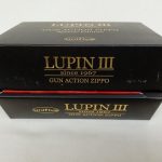 外箱と内箱を重ねた写真。LUPIN III GUN ACTION ZIPPOの文字