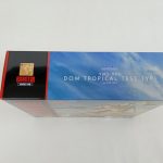 商品箱の上面。空の写真に『YMS-09D DOM TROPICAL TEST TYPE ver. A.N.I.M.E.』の文字