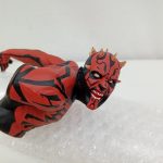 取り出した上半身。赤と黒の模様の顔と角