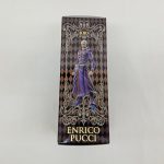 外箱の側面。フィギュアの絵と『ENRICO PUCCI』の文字