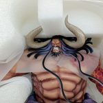 カイドウの顔と上半身の拡大。角と長い髪
